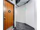 Well-lit hallway with access to unit 1070 at 2020 Arapahoe St # 1070, Denver, CO 80205