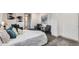 Relaxing bedroom setup, featuring a comfy bed and cozy sitting area at 4445 Milwaukee St, Denver, CO 80216