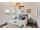 This is a Primary bedroom with white walls and a ceiling fan at 4445 Milwaukee St, Denver, CO 80216