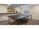 Finished basement recreation area featuring a ping pong table at 6765 Tabor St, Arvada, CO 80004