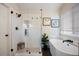 Spa-like bathroom with a soaking tub and walk-in shower at 6765 Tabor St, Arvada, CO 80004