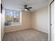 Bright bedroom featuring a window seat and plush carpeting at 6765 Tabor St, Arvada, CO 80004