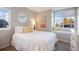 Spacious bedroom with window seat and neutral decor at 6765 Tabor St, Arvada, CO 80004