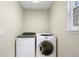 Convenient laundry room equipped with modern washer and dryer at 10532 Wintersweet Ct, Parker, CO 80134