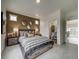 Primary bedroom with ensuite bathroom and walk-in closet at 12940 E 103Rd Ave, Commerce City, CO 80022