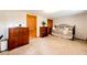 Inviting bedroom featuring a daybed, wood trim, and plush carpeting at 8788 E Tanglewood Rd, Franktown, CO 80116