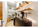 Walk-in Pantry with a built-in beverage center and shelving at 8788 E Tanglewood Rd, Franktown, CO 80116