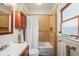 Updated bathroom with shower/tub combo and new fixtures at 4234 N Raleigh St, Denver, CO 80212