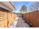 Long driveway leading to backyard and garage at 1742 S Alcott St, Denver, CO 80219