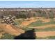 Image of the Ruby Hill Bike Park featuring dirt jumps, obstacles, and a view of the city skyline at 1742 S Alcott St, Denver, CO 80219