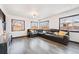 Spacious living room with large windows, and comfortable seating. Great for relaxation at 1742 S Alcott St, Denver, CO 80219