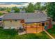 Aerial view of house and backyard at dusk at 3701 W Greenwood Pl, Denver, CO 80236