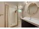 Basement bathroom with shower and vanity at 3701 W Greenwood Pl, Denver, CO 80236