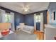 bedroom with navy walls, star decals, and twin bed at 3701 W Greenwood Pl, Denver, CO 80236