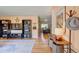 Bright living room with hardwood floors and ample natural light at 3701 W Greenwood Pl, Denver, CO 80236