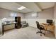 Finished basement office with desk and seating at 3701 W Greenwood Pl, Denver, CO 80236