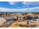 An expansive estate with a circular driveway, fountain, and mountain views at 6302 Charrington Dr, Cherry Hills Village, CO 80111