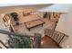 Carpeted game room with pool table, fireplace, and adjacent seating area with sofa at 6302 Charrington Dr, Cherry Hills Village, CO 80111