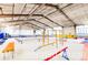 Well-equipped gymnastics training facility with mats, bars, and balance beams for athletes at 6302 Charrington Dr, Cherry Hills Village, CO 80111