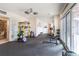 Well-equipped home gym featuring weightlifting equipment, rubber flooring, and mirrored wall at 6302 Charrington Dr, Cherry Hills Village, CO 80111