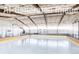 Indoor ice rink with freshly Zambonied ice and clean, bright lighting for skating activities at 6302 Charrington Dr, Cherry Hills Village, CO 80111
