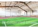Indoor sports field with artificial turf, perfect for soccer, football, and other activities at 6302 Charrington Dr, Cherry Hills Village, CO 80111