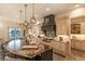Gourmet kitchen with custom cabinets, a granite island, and stainless steel appliances at 6302 Charrington Dr, Cherry Hills Village, CO 80111