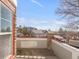 A private balcony provides a view of the neighborhood with well-maintained townhome exteriors at 12814 Jasmine St # C, Thornton, CO 80602