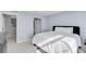 Spacious bedroom featuring a large comfortable bed and walk in closet at 12814 Jasmine St # C, Thornton, CO 80602