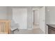 Bright bedroom features a large closet, rocker, and neutral colors at 12814 Jasmine St # C, Thornton, CO 80602