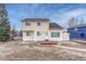 Two-story house back with deck and fenced yard at 206 Oxbow Dr, Monument, CO 80132