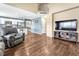 Bright living room featuring hardwood floors and a fireplace at 206 Oxbow Dr, Monument, CO 80132