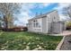 Exterior view of home showcasing backyard and deck at 13340 Saint Paul St, Thornton, CO 80241