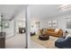 Spacious finished basement with a modern sofa, rug, and entertainment area with games at 13340 Saint Paul St, Thornton, CO 80241