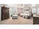 Spacious main bedroom features a four-poster bed, sitting area, and serene decor at 13340 Saint Paul St, Thornton, CO 80241