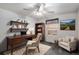 Charming home office with a desk, shelving, chair, and natural light at 13340 Saint Paul St, Thornton, CO 80241