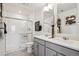 Bathroom with double vanity and a shower at 948 Andrews Crest Dr, Berthoud, CO 80513