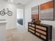 Upstairs hallway with stylish dresser and wall art at 948 Andrews Crest Dr, Berthoud, CO 80513