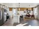 Modern kitchen with stainless steel appliances and an island at 948 Andrews Crest Dr, Berthoud, CO 80513