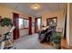 Bonus room with dual windows and a comfortable massage chair at 33121 Lynx Ln, Evergreen, CO 80439