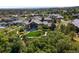 Expansive estate showcases manicured lawns, lush landscaping, and a grand residence at 7767 Dante Dr, Littleton, CO 80125