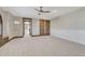 Large bonus room with plush carpet, custom woodwork, and plenty of open space at 7767 Dante Dr, Littleton, CO 80125