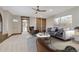 Spacious living room with stylish furniture, neutral colors, and lots of natural light at 7767 Dante Dr, Littleton, CO 80125
