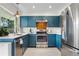 Beautiful kitchen with stainless steel appliances, designer backsplash, and white countertops at 6700 W 80Th Cir, Arvada, CO 80003