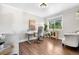 Bright home office with hardwood floors, neutral walls, and a large window for natural light at 6700 W 80Th Cir, Arvada, CO 80003