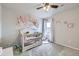 Adorable Bedroom with crib, decor and plenty of natural light at 1853 Griffin Dr, Brighton, CO 80601