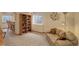 Spacious basement includes a wet bar, a bookshelf and comfortable seating at 1825 Keota Ln, Superior, CO 80027