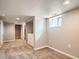 Basement area featuring carpeting and a laundry area at 4804 N Raleigh St, Denver, CO 80212