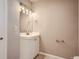 Bathroom featuring modern vanity and lighting fixtures at 4804 N Raleigh St, Denver, CO 80212