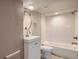 Cozy bathroom with subway tile in shower and a pedestal sink at 4804 N Raleigh St, Denver, CO 80212